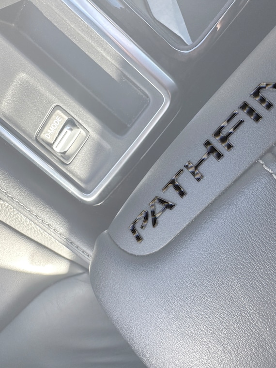 Tufskinz |  Center Console Lid Letter Inserts - Fits 2022-2025 Nissan Pathfinder - 10 Piece Kit
