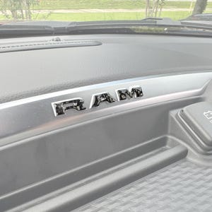 Tufskinz | Center Dash Letter Overlays - Fits 2025-2026 RAM 1500/2500/3500 - 3 Piece Kit