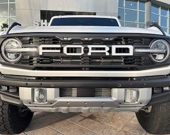 Tufskinz | Grille Letter Overlays - Fits 2021-2025 Bronco Raptor - 4 Piece Kit