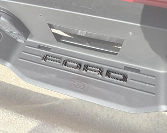 Revestimientos de letras para parachoques trasero Tufskinz - Compatible con F-150 Lightning 2021-2026 - Kit de 4 piezas