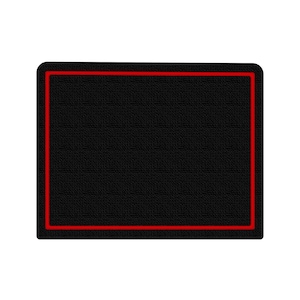 May include: A rectangular black mat with a textured surface and a thin red border. The mat has rounded corners and is set against a white background. The design is simple and modern.