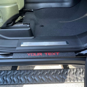 Tufskinz | Custom Text Door Sill Protection - Fits 2021-2025 Chevrolet Tahoe - 2 Piece Kit