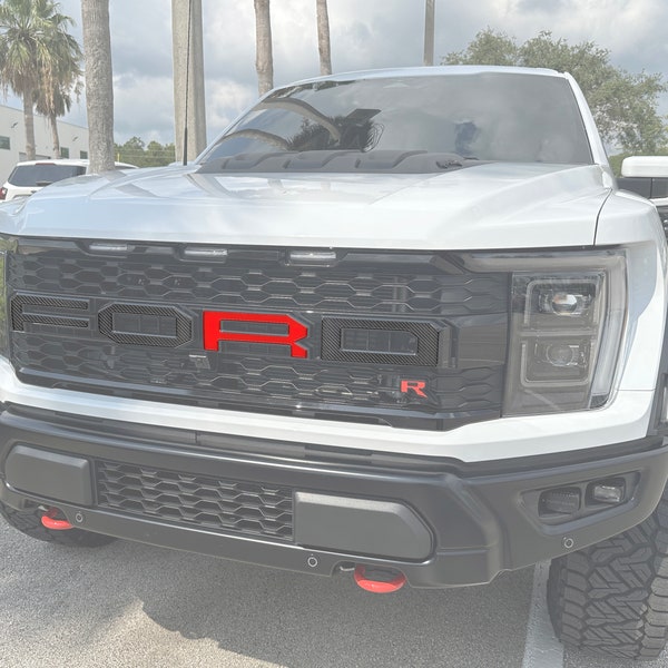 Tufskinz | Grille Letter Overlays - Fits 2021-2023 F-150 Raptor - 4 Piece Kit