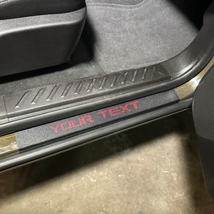 Tufskinz | Custom Text Door Sill Textured Overlays Fits 2023-2025 Chevrolet Colorado & GMC Canyon