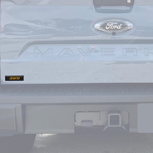 Tufskinz | AWD & Hybrid Badge - Fits Any Vehicle