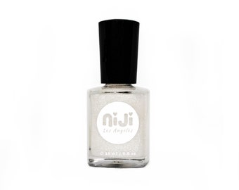 Capa superior con purpurina iridiscente Dancing Stars: esmalte de uñas vegano sin colorantes ni colorantes artificiales.