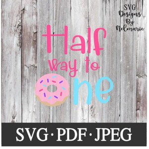May include: Pink and blue graphic with the text "Half way to one" and a pink donut with sprinkles. The background is a wood grain pattern.