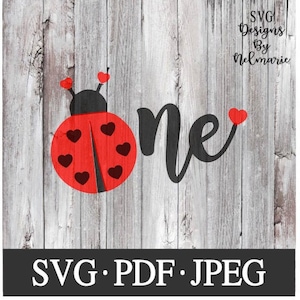 May include: A red ladybug design with black heart accents and the word "one" in black script. The design includes the text "SVG Designs By Nelmarie" and "SVG.PDF.JPEG" on a weathered wood background.
