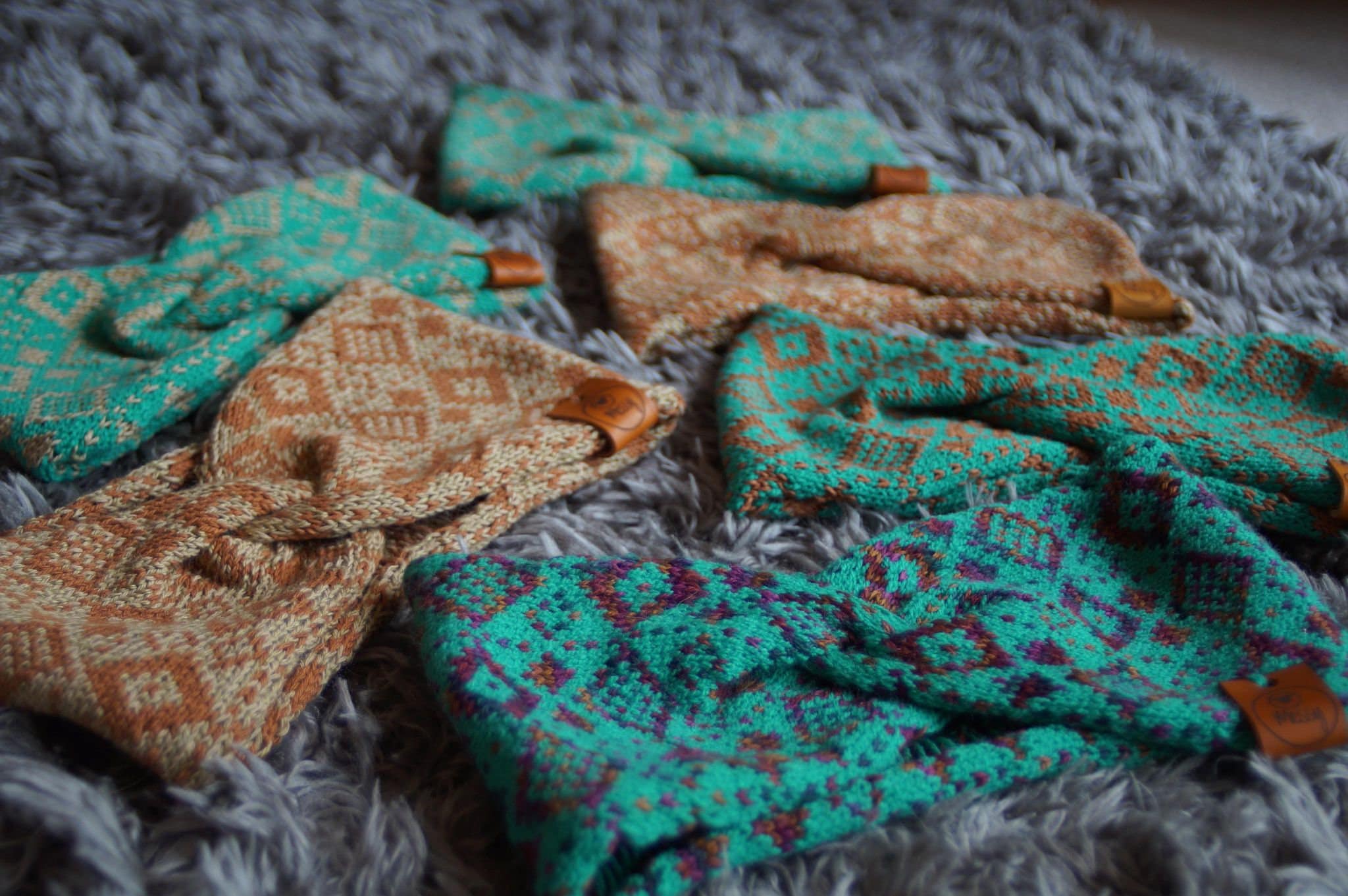 Wide knitted headbands / ear warmers.