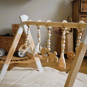 Jeu en bois pliable Gym Baby Gym rack activité jouets suspendus - Chine  Jouet en bois et Meubles de bébé prix