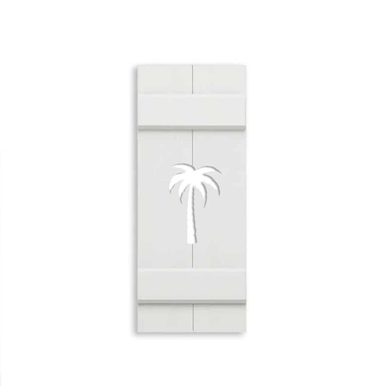 May include: A white wooden shutter with a cut-out palm tree design. The shutter is rectangular with horizontal and vertical lines, and the palm tree is centered. The design is simple and modern.