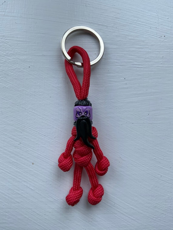 Taser Face Buddy Keychain Keyring Backpack Accessory Etsy Taser Face Buddy Keychain Keyring Backpack Accessory Etsy
