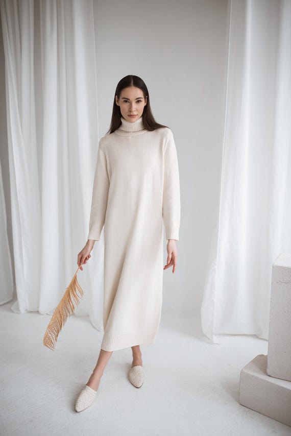 longline knitted dress S w e a t e r 1 5 longline This sweater dress is definitely a stand alone piece I know it looks like a huge knitting commitment but let