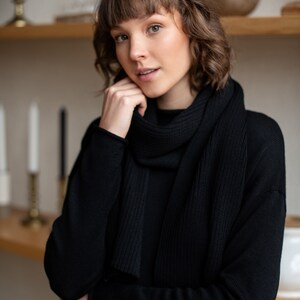 Black merino wool scarf.