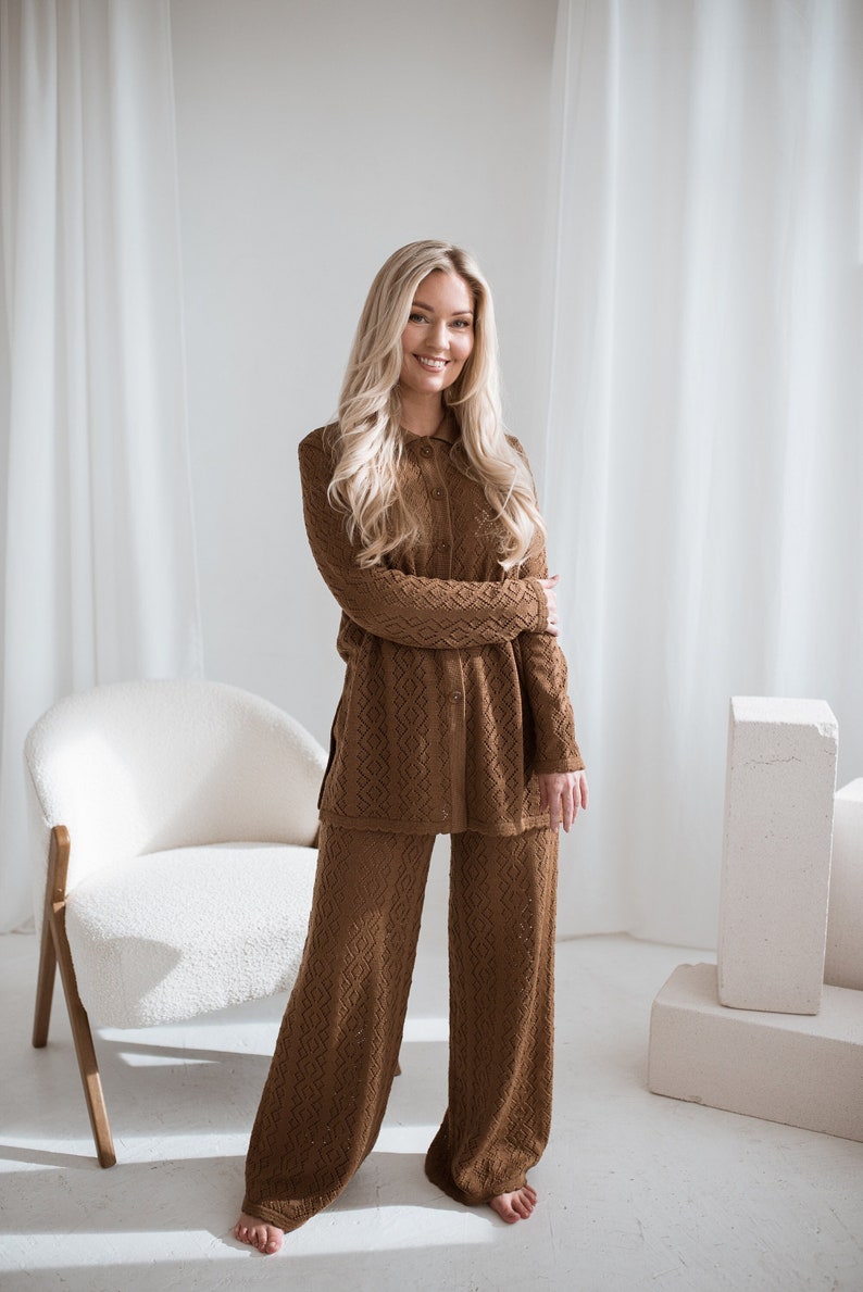 A set of wide leg pants and a tunic. The set is made of pure merino wool.