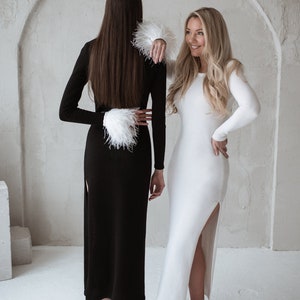 Two dresses in black and white merino wool