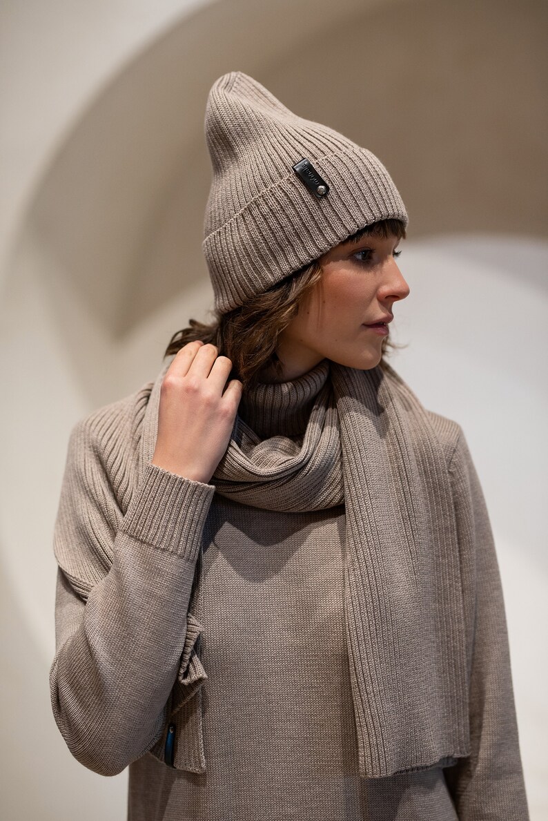 A timeless, elegant knitted scarf and a hat. Stylish and practical.
