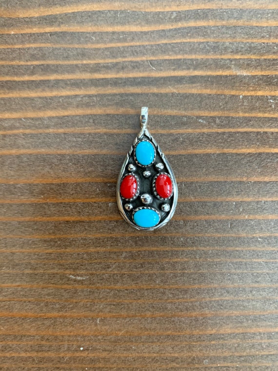 Turquoise and coral pendant