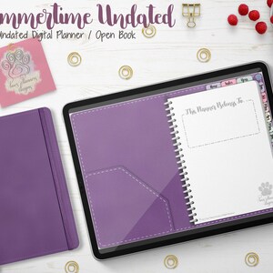 May include: A digital planner with the text "Summertime Undated" and "Undated Digital Planner / Open Book." The planner is purple and has a paw print logo. A matching purple notebook and a tablet with a stylus are also visible.