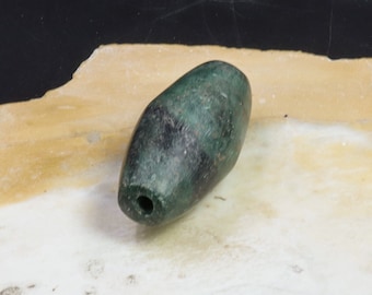 Antica grande perlina serpentina