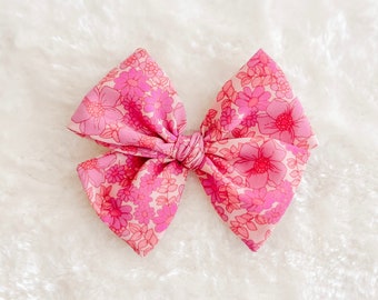 Pink bow, Sweet Pink Floral Bow, girl bows, baby bows, nylon headband bows, serged edge bows, fable bow, pinwheel bow, Valentine’s Day