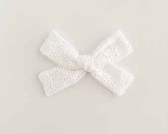 White bows, classic bows, White Eyelet Schoolgirl Bow, girl bows, baby bows, nylon headband bows, serged edge bows, fable bow, pinwheel bow