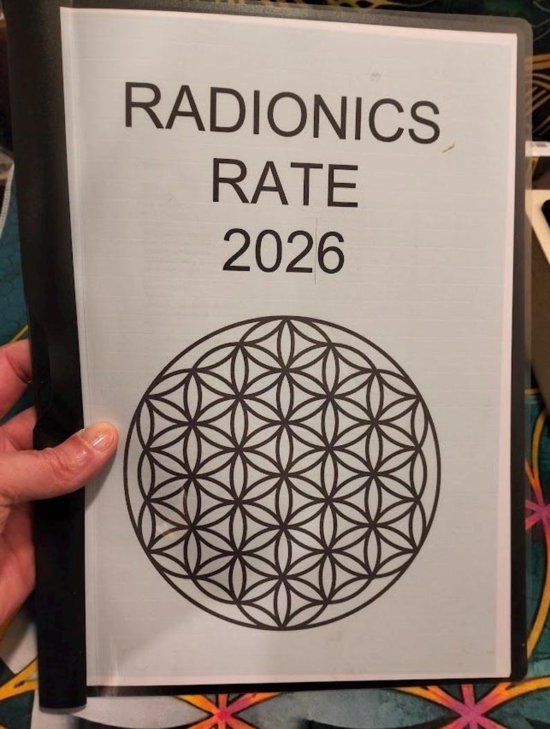 May include: A light blue paper with the words "RADIONICS RATE 2026" in black font. Below the text is a black and white geometric design of interlocking circles, held in a black binder.