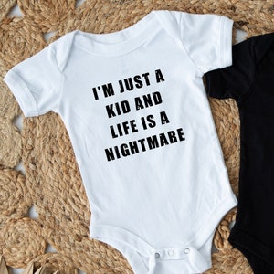 I'm Just a Kid and Life is a Nightmare Baby Bodysuit