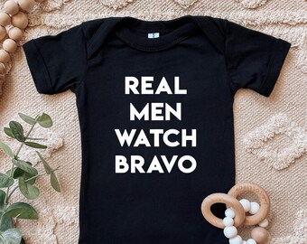 Real Men Watch Bravo Baby Bodysuit