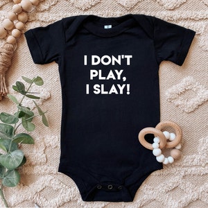 I Don't Play, I Slay! Baby Bodysuit