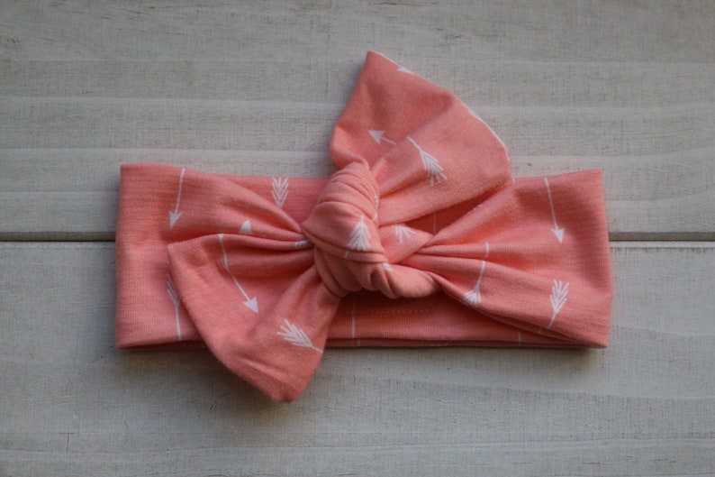 Coral arrow knot bow