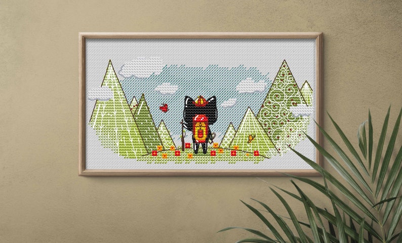 May include: Cross-stitch pattern of a black cat wearing a red hat and carrying a stick, standing in a green and blue landscape with mountains and clouds.