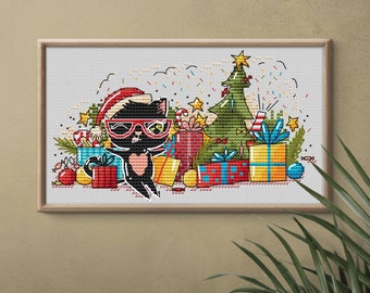 May include: Cross-stitch art featuring a black cat wearing sunglasses and a Santa hat, surrounded by wrapped gifts and a Christmas tree. The artwork is framed in a wooden frame and includes festive decorations.