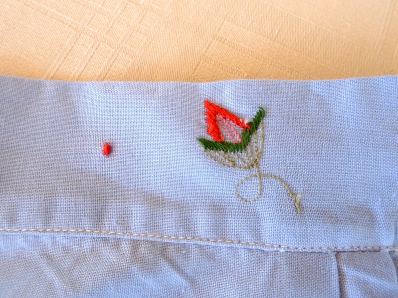 Vintage Embroidered light blue cotton apron with flowers and pocket