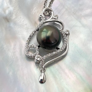 10mm Natural Color Tahitian Cultured Pearl Pendant with White Topaz accent