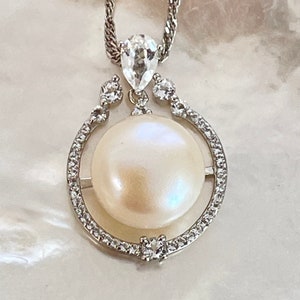 12-12.5mm Natural Color White Freshwater Cultured Pearl Pendant with Rhodium plating & Topaz accent