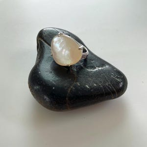 Ivory White South Sea Mother of Pearl Ring with White Zircon Accent
