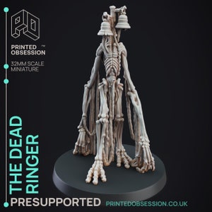 May include: A 32mm scale miniature of a skeletal figure with multiple arms and hands, standing on a black base. The figure is holding two bells and has a rope-like material hanging from its body. The miniature is titled "The Dead Ringer" and is pre-supported.