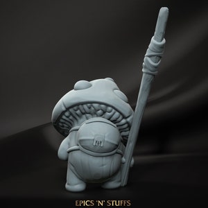 May include: A gray 3D printed figurine of a mushroom creature holding a stick. The creature has a large mushroom cap with a detailed texture and a small body with a backpack. The stick is wrapped with a band of material.