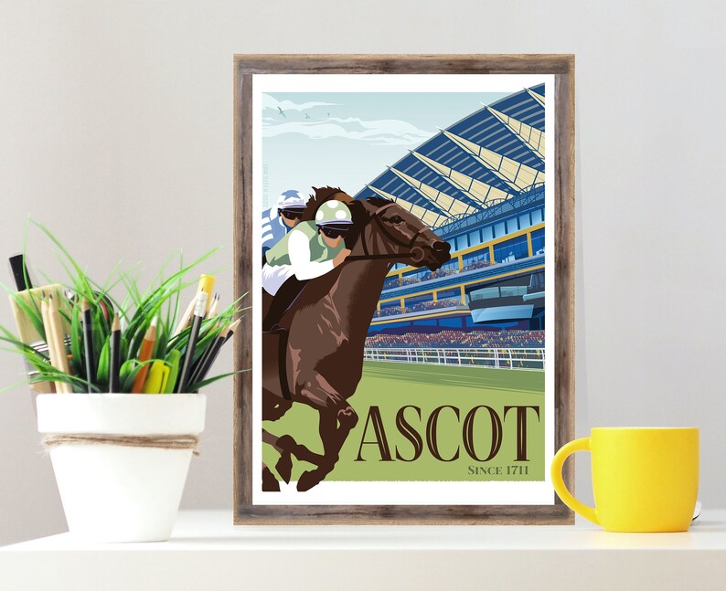 May include: Framed print featuring a horse race scene at Ascot. The artwork depicts a jockey on a brown horse, racing past a grandstand. The print has a vintage style with the word "ASCOT" and "SINCE 1711" in a serif font.