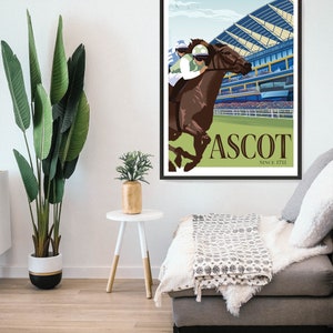 May include: A framed poster featuring a horse race scene at Ascot. The artwork depicts a brown horse with a jockey in green and white racing attire. The background shows a grandstand and the text "ASCOT SINCE 1711".