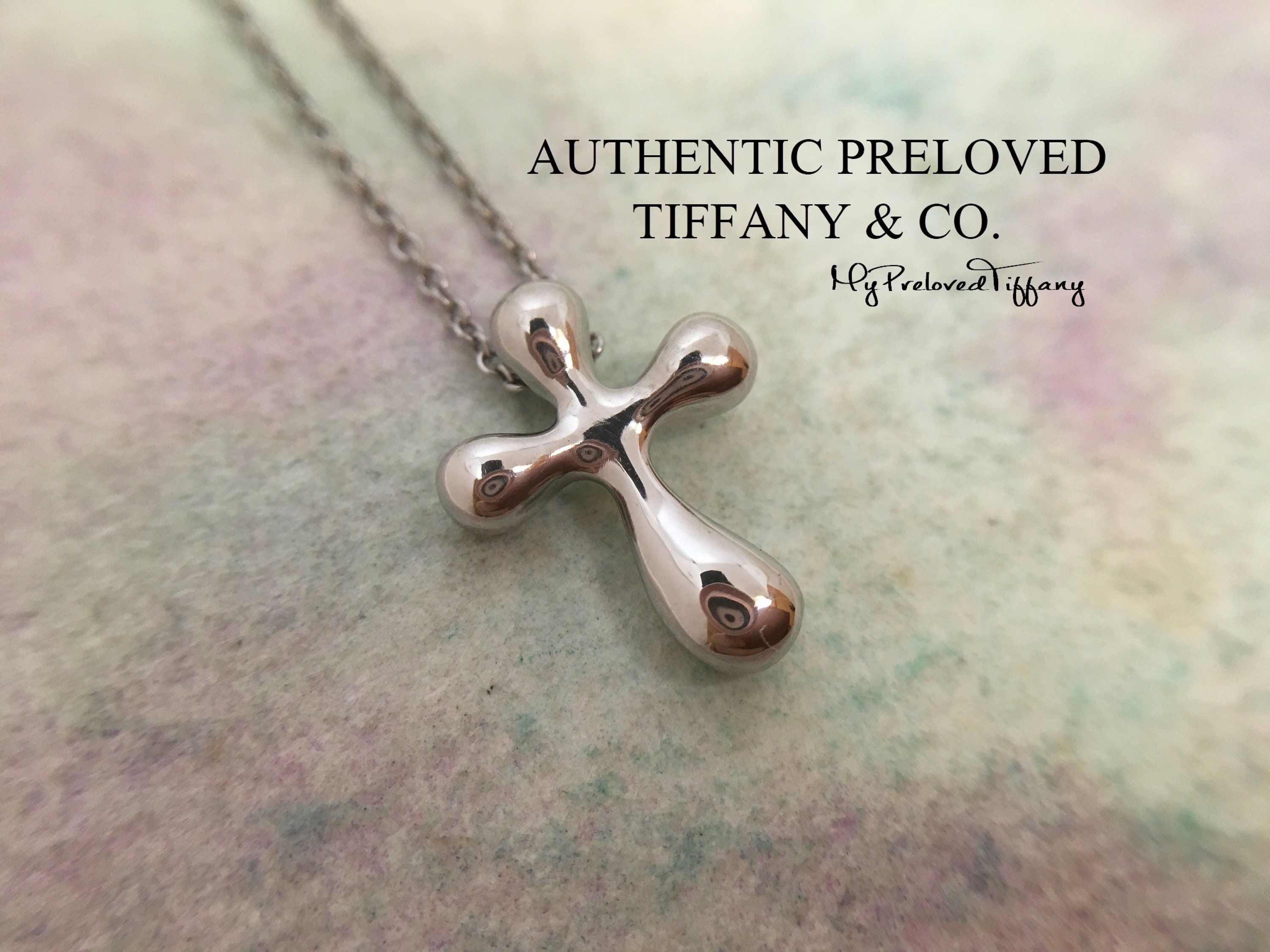 Tiffany cross 2024 necklace elsa peretti