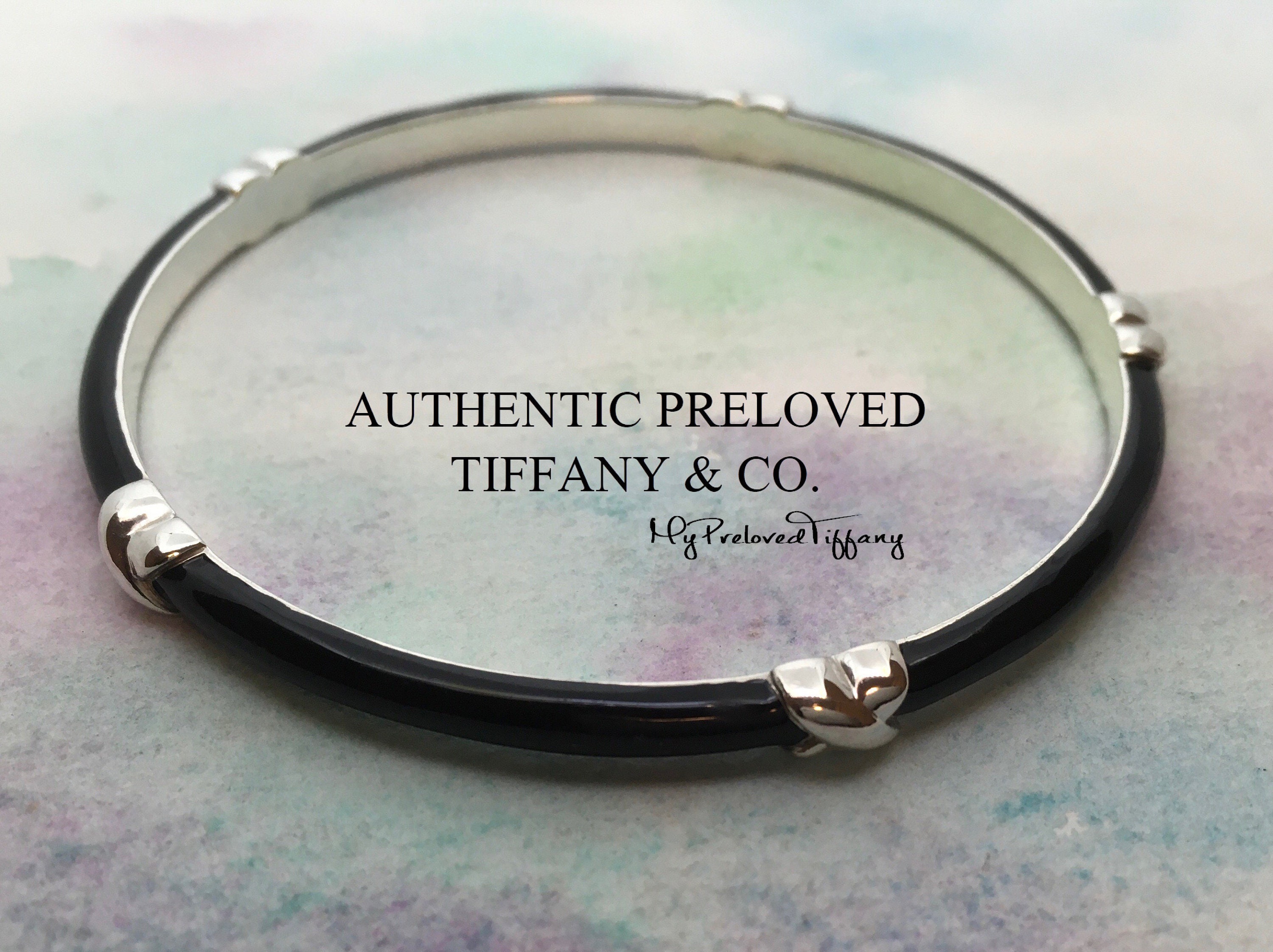 Return to Tiffany™ mini heart tag on a bead bracelet in 18k gold, medium. |  Tiffany & Co.