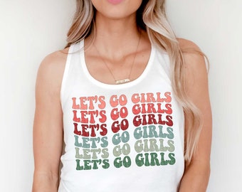 May include: White tank top with the phrase "Let's Go Girls" repeated in a rainbow of colors. The text is in a retro font style.