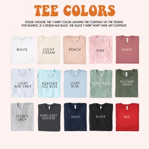 May include: A colour chart displaying fifteen t-shirt options with labels: White, Light Cream, Peach, Pink, Mauve, Light Ash Grey, Heather Ice Blue, Light Blue, Dusty Blue, Military Green, Sports Grey, Dark Grey Heather, Navy, Black, and Red.