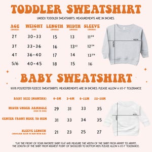 a baby sweater with measurements for a toddler sweater