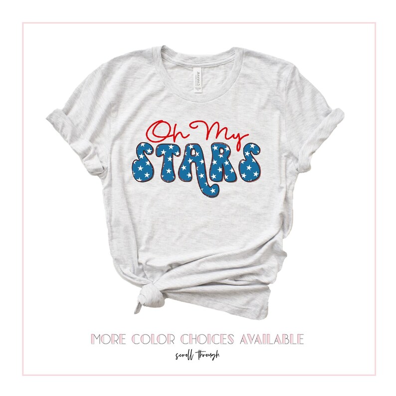 May include: A light gray t-shirt with the text "Oh My Stars" in red and blue. The text is in a retro font and features a pattern of white stars on a blue background.