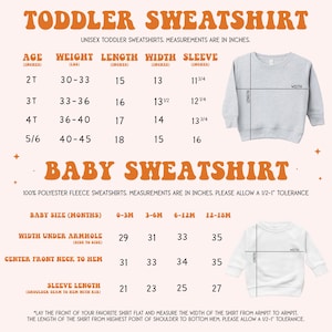 a baby sweater with measurements for a toddler sweater