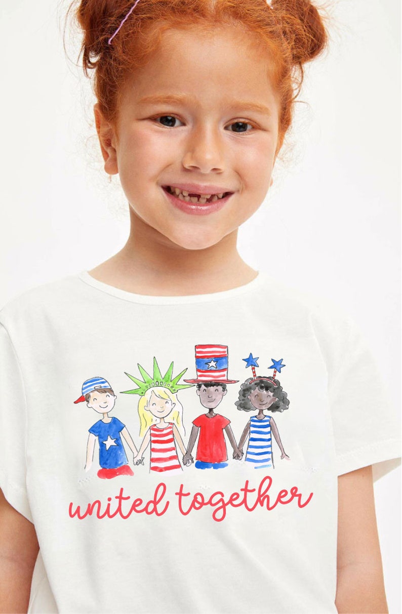 May include: White t-shirt with a graphic of four children holding hands. The children are wearing red, white, and blue clothing and have different skin tones. The text "united together" is printed in red below the graphic.