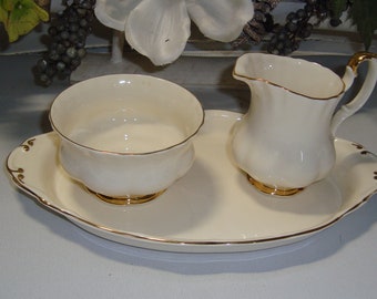 Royal Albert Affinity Gold 3-piece cream set in beautiful condition, including the gold edge